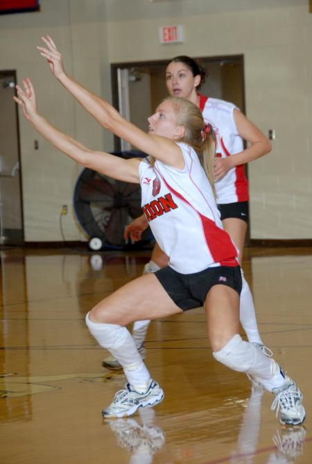 Sophomore Amanda Hutchison sets the ball. - Photo by Morris Abernathy