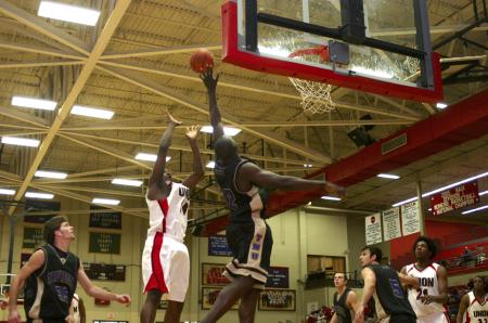 An opponent from Trevecca Nazarene University attempts to block a Pierry Valmera shot. - Photo by Stephanie Schroeder