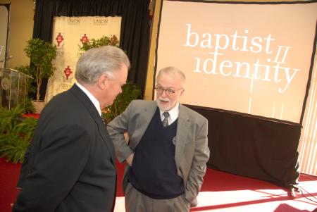 Timothy George (right), dean and professor of divinity at the Beeson Divinity School, fellowshipped with Paige Patterson, president of Southwestern Baptist Theological Seminary, shortly before Patterson's address at Union's second Baptist Identity Conference. - Photo by Morris Abernathy