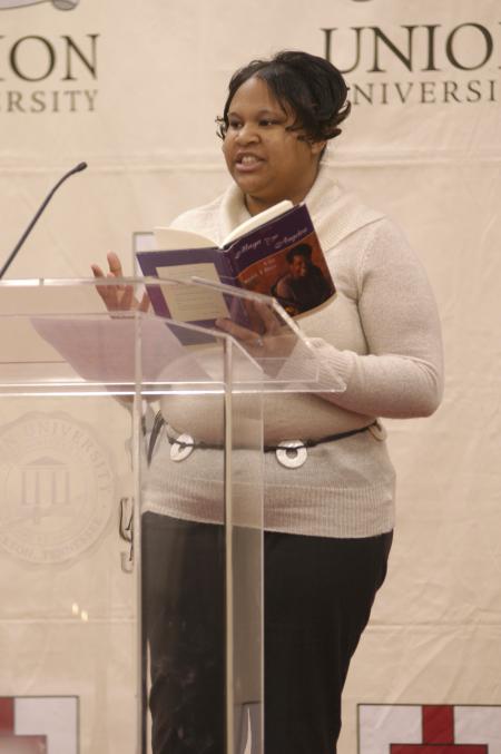 Freshman Katelynn Johnson read from the poetry of Maya Angelou during the First Annual Black History Month Program. - Photo by Wayne Holmes