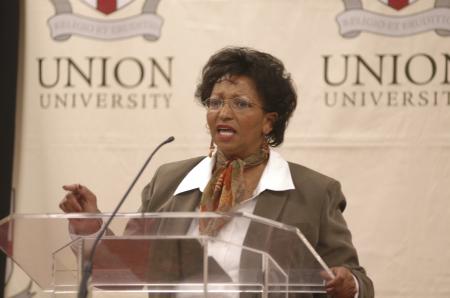 Dr. Camille Searcy spoke on the educational philosophies of W.E.B. Du Bois & Booker T. Washington during the First Annual Black History Month Program. - Photo by Wayne Holmes