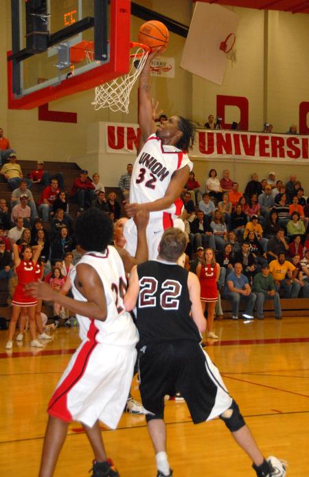 Senior guard Mack Bealim goes up for a layup in Union's 76-58 win over Freed-Hardeman in the TranSouth Conference Tournament. - Photo by Morris Abernathy