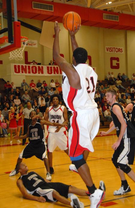 Sophomore Brian Lake takes a short jumper in Union's opening game of the TranSouth Conference Tournament. - Photo by Morris Abernathy