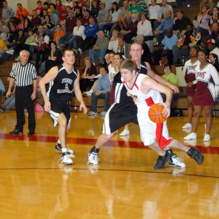 Jeremiah Wade drives to the basket in Union's quarterfinal win over Freed-Hardeman in the conference tournament.
 - Photo by Morris Abernathy