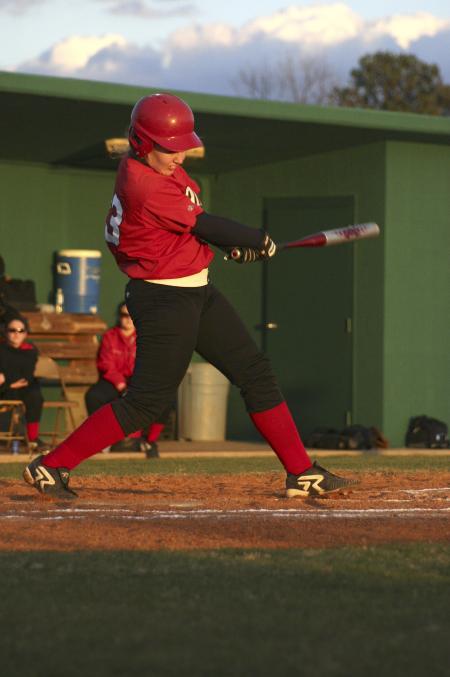 Freshman Candice Thompson drove the ball to center in the bottom of the fifth inning during a game against Spring Arbor University, Mich. The Lady Bulldogs finished the game with a 1-0 victory. - Photo by Stephanie Schroeder