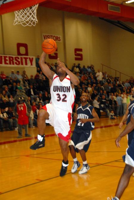 Mack Bealim (32) goes up for a layup against Lambuth in the semi-final game of the TranSouth Tournament. - Photo by Morris Abernathy