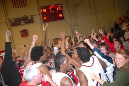 The fans celebrate with the Bulldogs after their OT victory over Lambuth in the semi-final game of the TranSouth Tournament. - Photo by Morris Abernathy