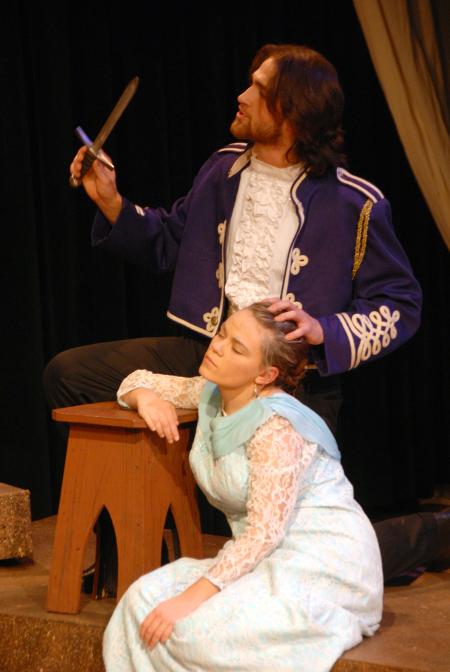 David Longobardo as Antonio talks of the murder of the sleeping Julie Palmer as Alisha in the theatre's production of <em>The Tempest</em>. - Photo by Morris Abernathy
