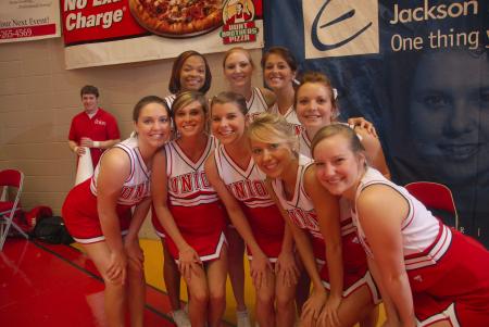 The cheerleading squad poses for photo after the Lady Bulldog's victory in the first round of the NAIA National Tournament. - Photo by Morris Abernathy