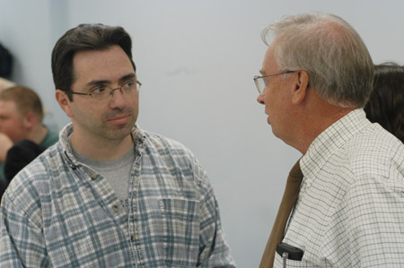 Kirby Atkins, a computer animator and 1991 graduate of Union University, speaks with Mathematics professor Don Richard shortly before Kirby's session on computer animation & digital filmmaking. - Photo by Cam Tracy
