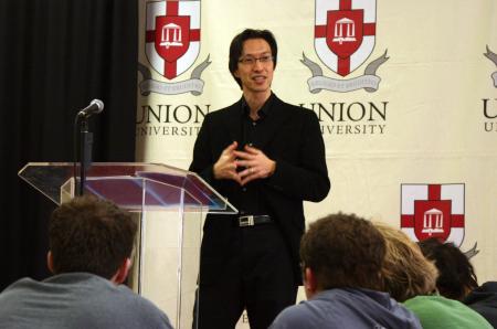 Makoto Fujimura, guest artist and speaker, talks with faculty and students during a luncheon held after chapel. - Photo by Stephanie Schroeder