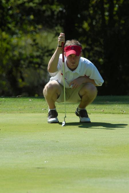Drew Cannon eyes the line of a put during the Union Invitational at Falcon Ridge Golf Club. - Photo by Morris Abernathy
