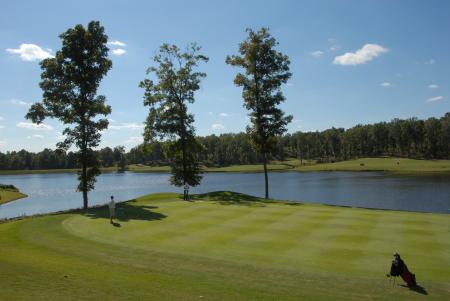 A Union golfer stands alone on the green during a round in the Union Invitational at Falcon Ridge Golf Club. - Photo by Morris Abernathy