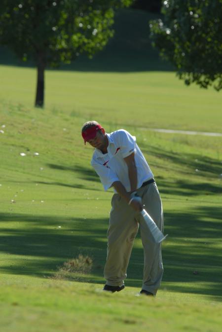 Gary Glapa digs a shot out of the edge of the rough during the Union Invitational at Falcon Ridge Golf Club. - Photo by Morris Abernathy