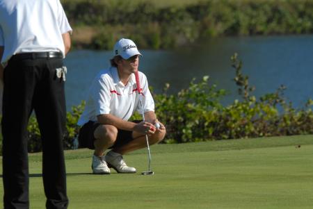 William Boyd surveys the green before one of his puts in the Union Invitational at Falcon Ridge Golf Club. - Photo by Morris Abernathy