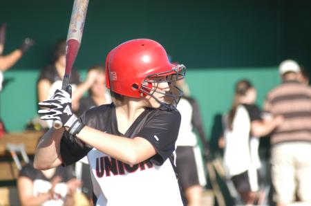 Kristen Kirk eyes the pitcher during an at-bat in Union's double-header sweep over Freed-Hardeman. - Photo by Steven Aldridge