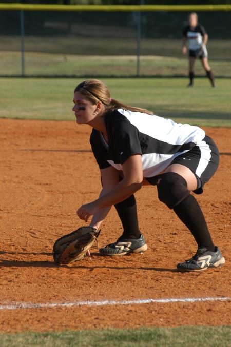 First baseman Brandy Hoffman is down and ready for the play at first base. - Photo by Steven Aldridge