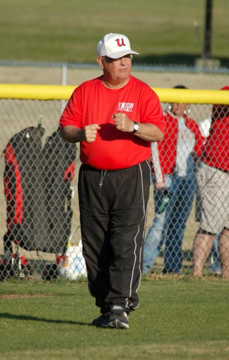 Union head coach Dr. David Blackstock pumps his fist after the play. - Photo by Steven Aldridge