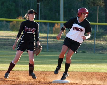 Junior Ashley Walters rounds second during a Union win over Freed-Hardeman University. - Photo by Steven Aldridge