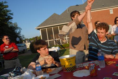 Douglas Martin is declared the winner in the wings eating competition during Happy Trails. - Photo by Morris Abernathy
