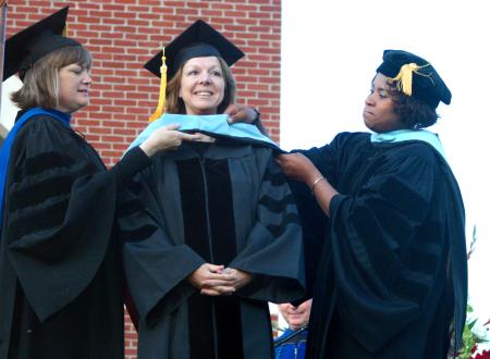 Barbara Bailey Guffey is hooded as she receives the Doctor of Education. - Photo by Stephanie Schroeder