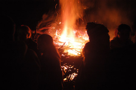 <i>Tornado Bonfire:</i> The SGA sponsored this fiery gathering on the intramural field to celebrate the spirit exhibited on campus during the clean-up. - Photo by Jim Veneman