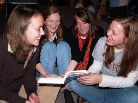 Students sang carols before Predsient Dockery read the Christmas story to students in the McAfee Commons. - Photo by Beth Spain