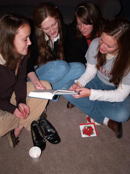 Students sang carols before Predsient Dockery read the Christmas story in the McAfee Commons. - Photo by Beth Spain
