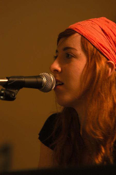 Recording artist Brooke Waggoner performs for an AIDS relief concert in McAfee commons presented by PRSSA. - Photo by Beth Spain