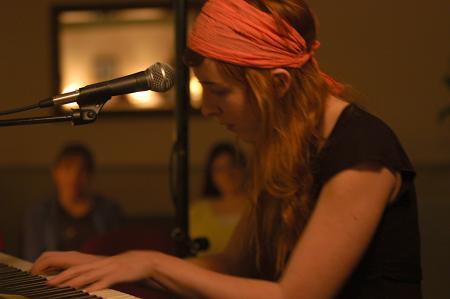 Recording artist Brooke Waggoner performs for an AIDS relief concert in McAfee commons presented by PRSSA. - Photo by Beth Spain