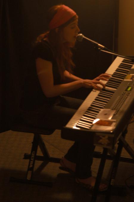 Recording artist Brooke Waggoner performs for an AIDS relief concert in McAfee commons presented by PRSSA. - Photo by Beth Spain