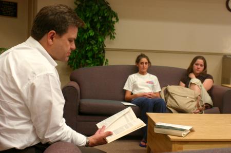 Rising Seniors Devon Sledd and Molly Mercker listen to Gene Fant, dean of college of arts & sciences, during a class session in the McAfee Commons. - Photo by Stephanie Schroeder