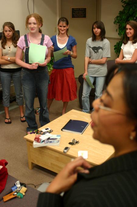 Rachel Moore and other Rising Senior students explain their survival strategy to Jacqueline Taylor, director of career services. - Photo by Stephanie Schroeder
