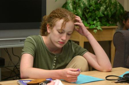 Rachel Moore completes a survival plan activity during a Rising Senior session. - Photo by Stephanie Schroeder