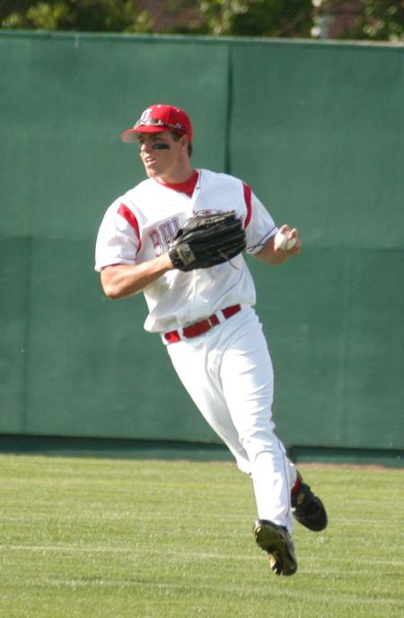Judson Powers prepares to make a throw back to the infield after a catch in center field. - Photo by Steven Aldridge