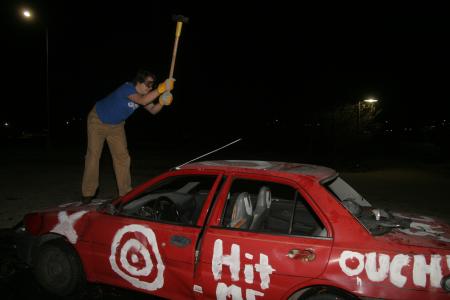 Jonathan Lambach destroys a car at the Frost Fest. - Photo by Kyle Kurlick