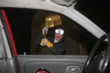 Ahsley Harrington helps destroy a car at the Frost Fest. - Photo by Kyle Kurlick