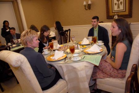 Kathy Southall, Katie Daniels, Drew Zimmer and Anika Schulte patiently wait for the start the Etiquette Luncheon. - Photo by Morris Abernathy