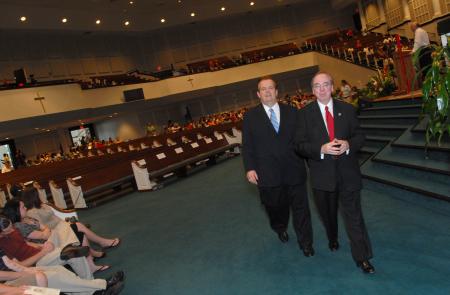 President Dockery arrives at West Jackson Baptist Church with Richard Land, president of the Ethics and Religious Liberty Commission of the Southern Baptist Convention, who was the keynote speaker for the August graduation ceremony. - Photo by Morris Abernathy