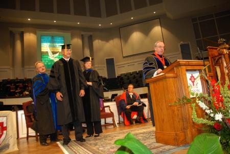 As part of the ceremony, Union presented an honorary Doctor of Humanities degree to Jim Moss, retiring president and CEO of West Tennessee Healthcare. Union President David S. Dockery said the university faculty and trustees vote on rewarding such a degree to someone who has demonstrated significant leadership and made considerable contributions to society.  - Photo by Morris Abernathy
