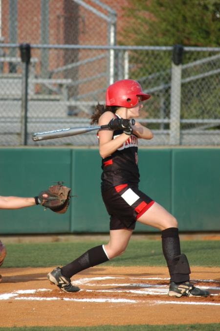 Michelle Albonetti take a cut during one of her at bats. - Photo by Steven Aldridge