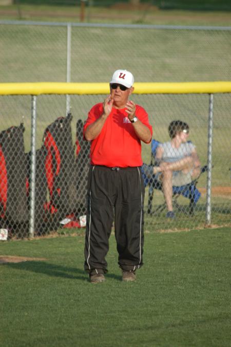 Head Coach David Blackstock encourages his players from the third base coaching box. - Photo by Steven Aldridge