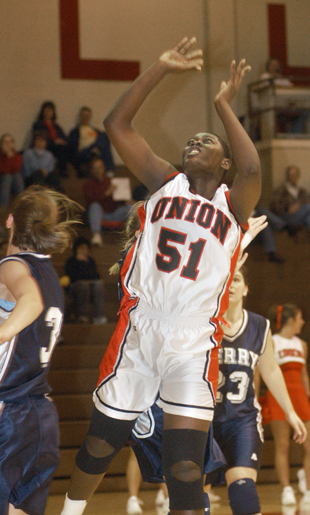 Miriam Wandanda (51) - sophomore center from Mambasa, Kenya - Photo by Jim Veneman