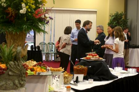 Hal and Mary Anne Poe, Mark Campbell and Randy Phillips fellowshipped with many of the students that attended the President's Reception in Coburn. - Photo by Stephanie Schroeder