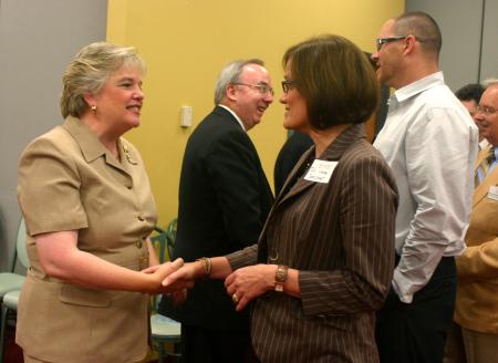 First Lady Lanese Dockery talks with Naomi Larsen, associate professor of sociology, as President Dockery greets faculty, staff and students as they entered Coburn for the President's Reception. - Photo by Stephanie Schroeder