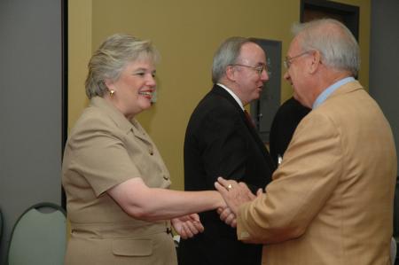 First Lady Lanese Dockery greeted Don Richard, associate professor of mathematics, at the President's Reception. - Photo by Neisha Fuson