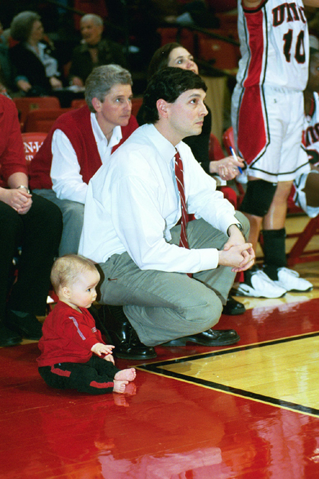 Head Coach Mark Campbell and his son Gray watch the final seconds of the Homecoming win against Blue Mountain. - Photo by Jim Veneman