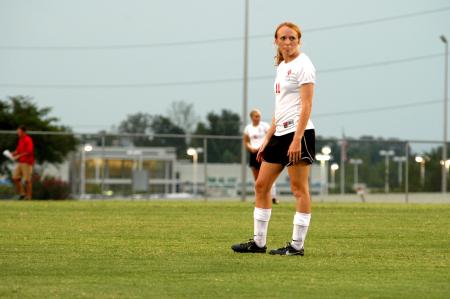 Brooke Walker, sophomore Nursing major, stands waiting for the match to resume. - Photo by Matt Elia
