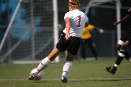 Caitlin Zimmerman, junior pre-physical therapy major, attacks the opponents' goal. - Photo by Matt Elia