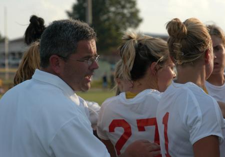Coach Boylan talks to the team - Photo by Steven Aldridge